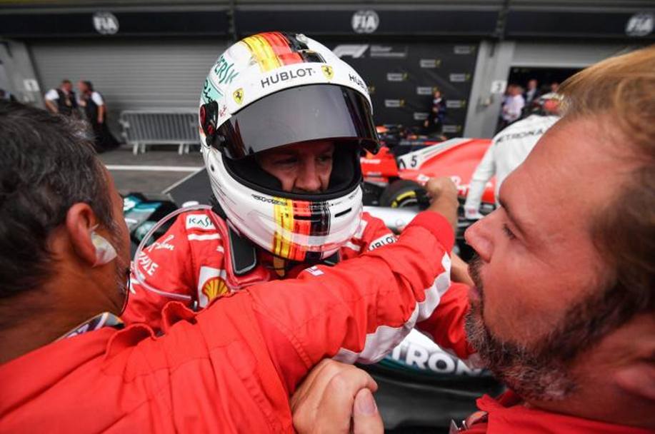 La festa di Sebastian Vettel, che in Belgio si  preso il 52 successo della sua carriera. Afp